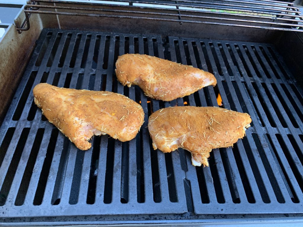Dry Rub Grilled Chicken on the grill